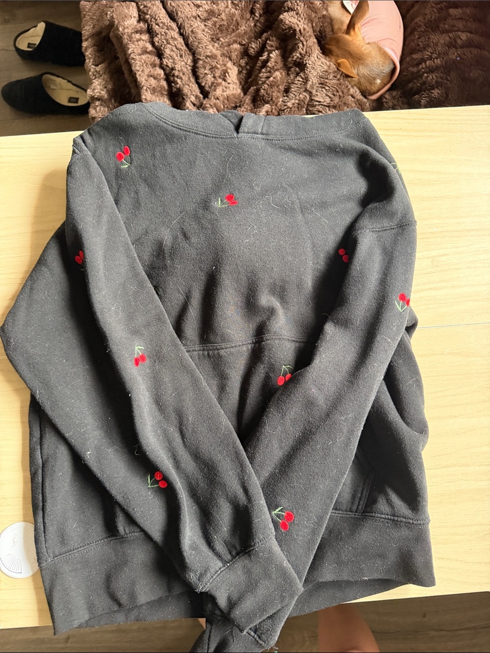 Reflex Black Top with White Brand Tag and Coral Nails